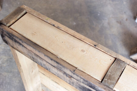 wood pallet with support boards put on the sides